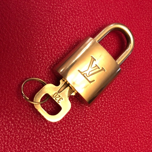 Louis Vuitton Handbags - 💯Authentic #314 (may be diff. #) Louis Vuitton Lock & Key EUC